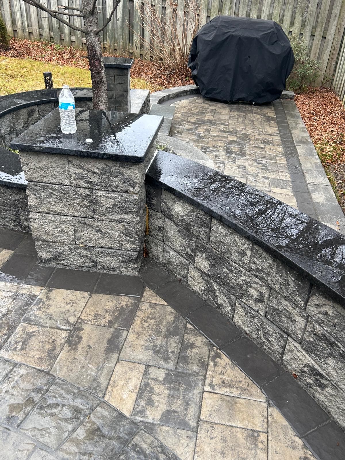 Stone wall with outdoor kitchen counter