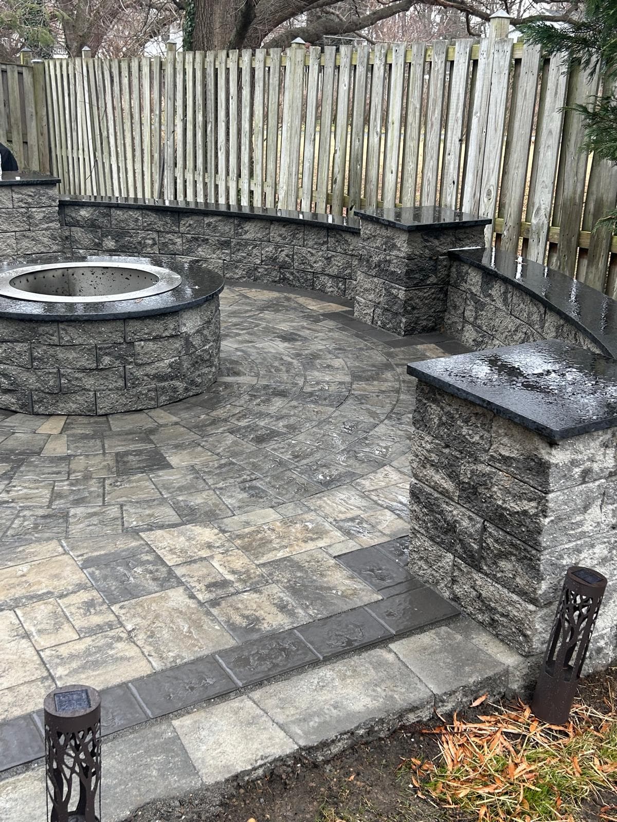 Fire pit and stone veneer outdoor living by Kaeler